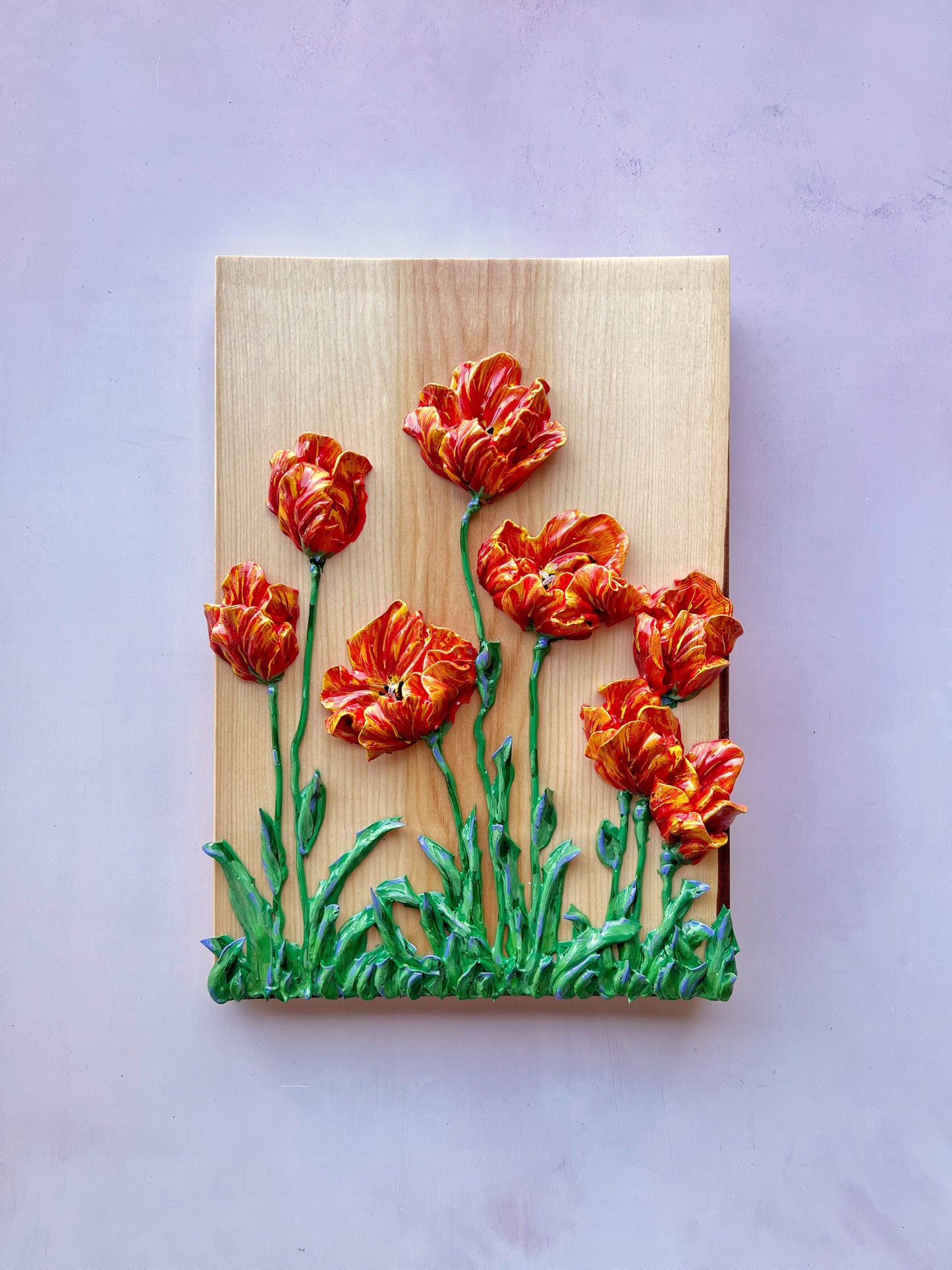 Variegated Red Tulips on Fir