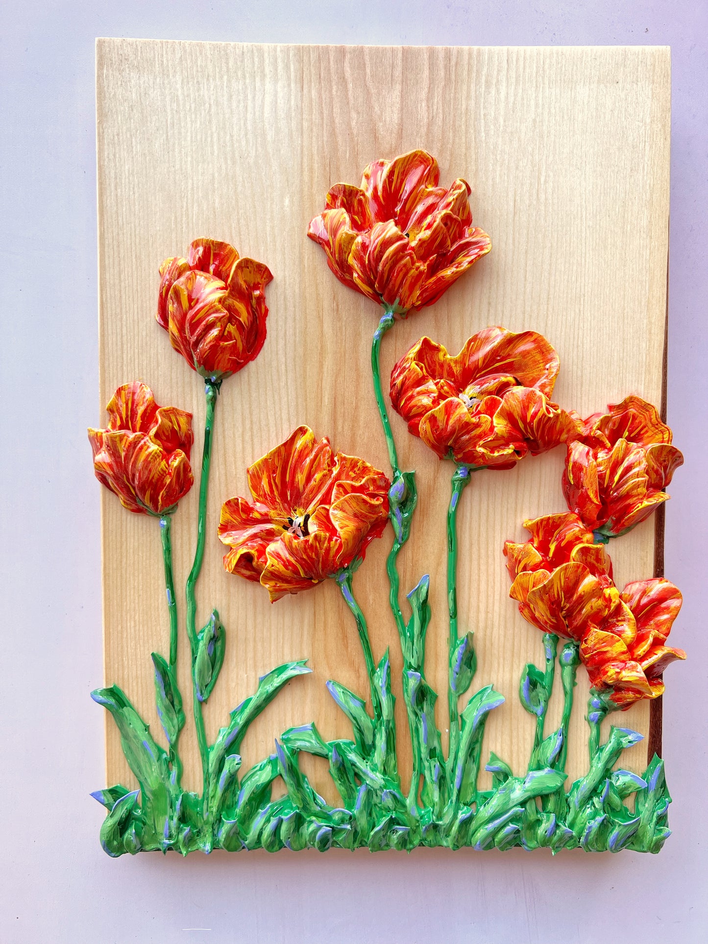 Variegated Red Tulips on Fir