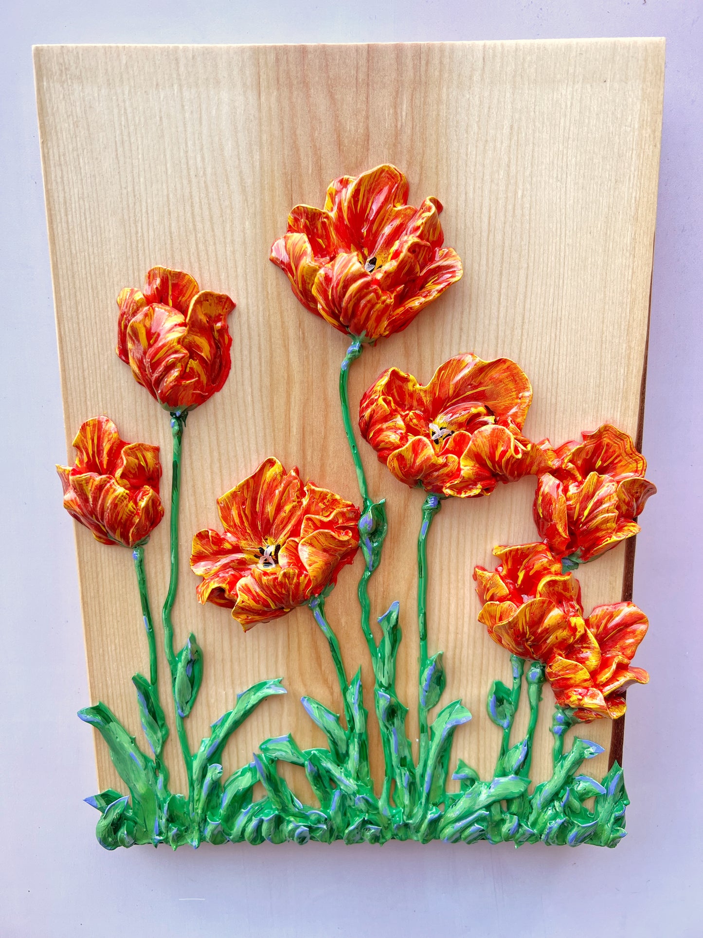 Variegated Red Tulips on Fir